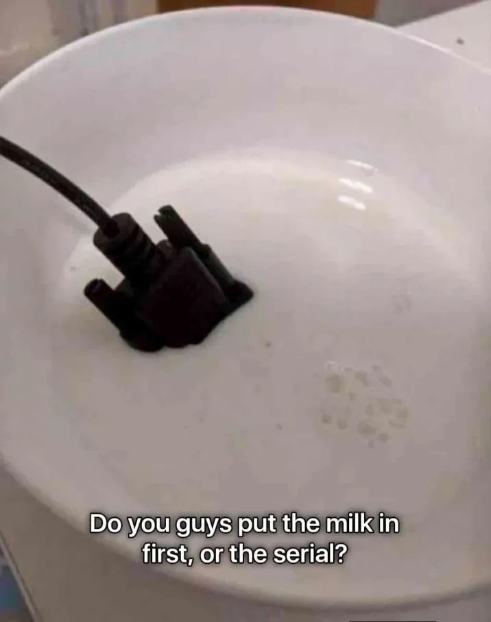 "Do you guys put the milk in first, or the serial?". Picture of a bowl of milk with a serial port connector inside