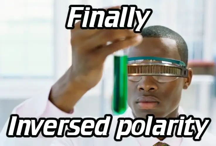 Ferson wearing La Forge's VISOR, looking at a test tube, saying "Finally, inversed polarity"